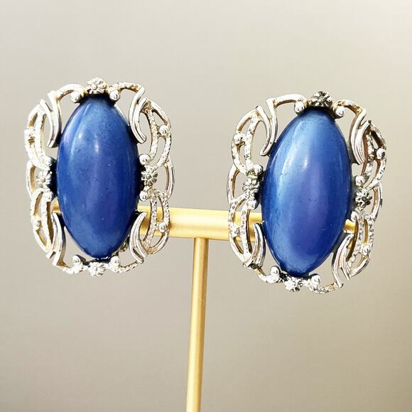 Sarah Coventry Jewelry - 1960 Vintage Sarah Coventry Carousel Blue Cabochon with Silver Clip Earrings